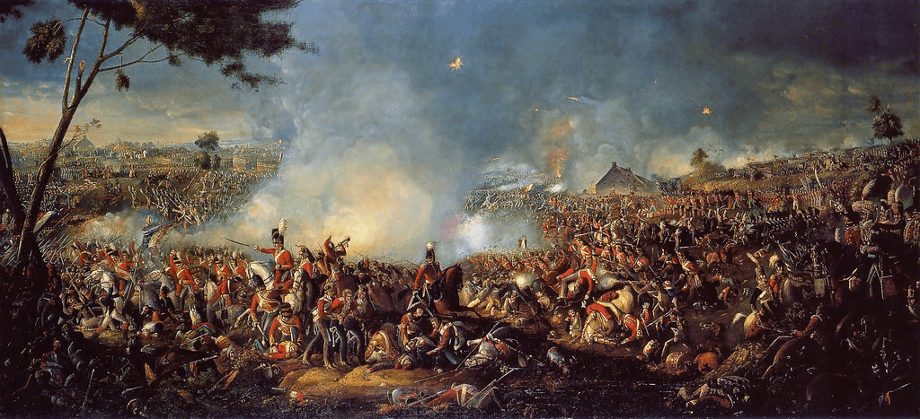 The battle of waterloo showing the armed forces on horseback, amid fire and smoke..